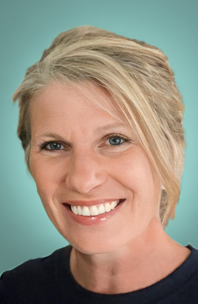 Robin LeVesconte, member of the Veterans Wellness Alliance, smiling for the camera against a teal background