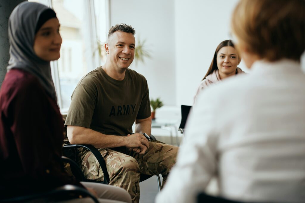 Group therapy session featuring a young male from the army