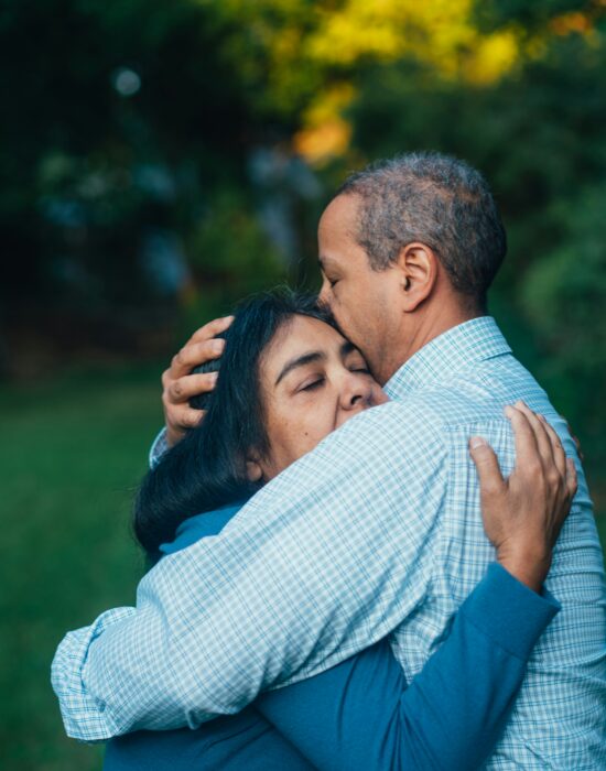 Middle-aged couple embracing